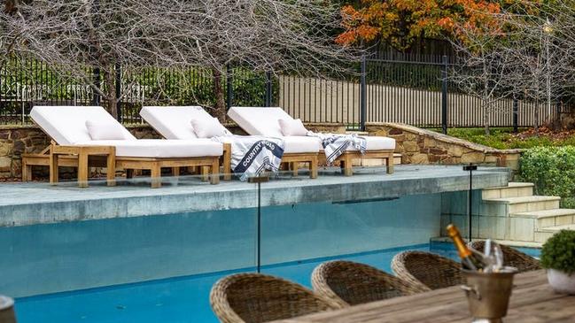 The alfresco area entertaining area is adjoined by a pool.