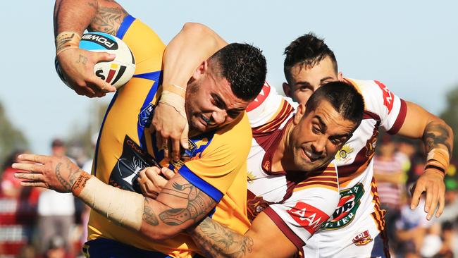 Andrew Fifita of City tackled by Paul Vaughan during the City Origin v Country Origin game at McDonalds Park, Wagga Wagga. pic Mark Evans