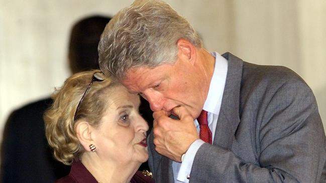 US President Bill Clinton confers with Secretary of State Madeleine Albright in 2000.