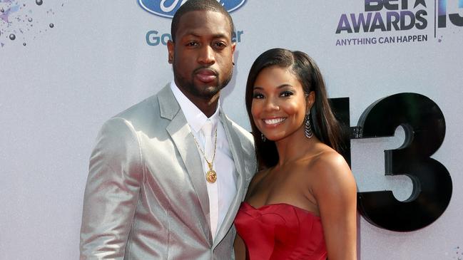 FILE - DECEMBER 21: Basketball player Dwyane Wade and actress Gabrielle Union are engaged. LOS ANGELES, CA - JUNE 30: NBA player Dwyane Wade and actress Gabrielle Union attend the 2013 BET Awards at Nokia Theatre L.A. Live on June 30, 2013 in Los Angeles, California. (Photo by Frederick M. Brown/Getty Images for BET)