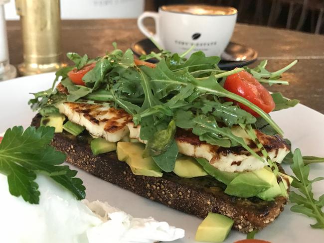 Avocado on toast with Toby's Estate Coffee at 80 Bay. Picture: Jenifer Jagielski