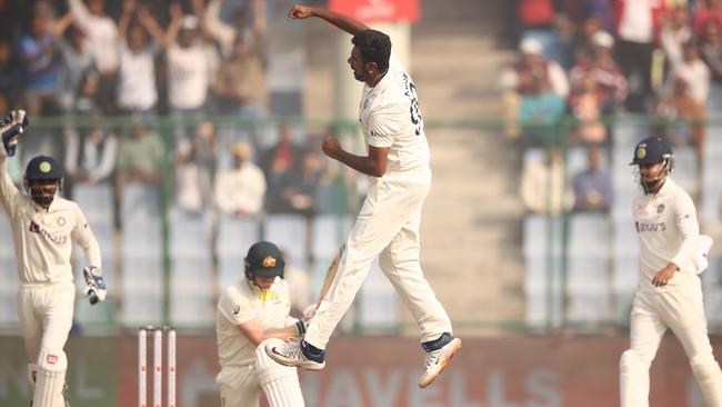 Ravichandran Ashwin celebrates taking the wicket of Steve Smith during a test match in 2023.