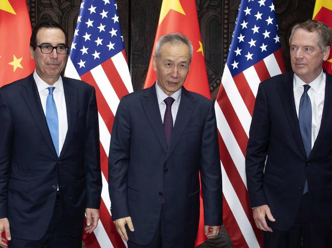 Chinese Vice Premier Liu He (C), US Trade Representative Robert Lighthizer (R) and Treasury Secretary Steven Mnuchin at the Xijiao Conference Center in Shanghai. Picture: AFP