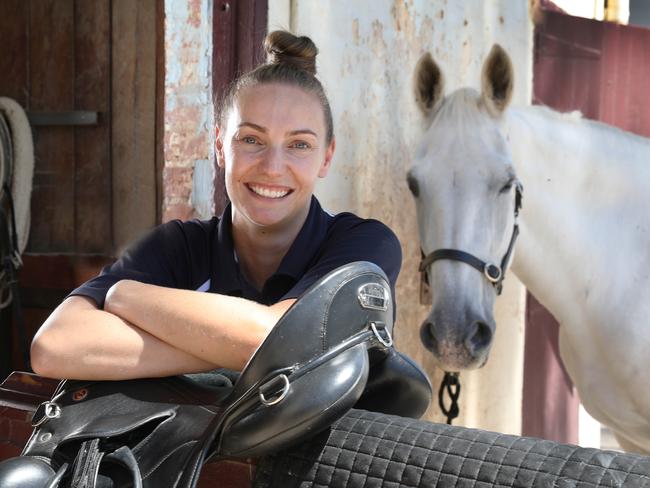 Police Mounted Operations Unit Will Reveal Its New Location as Park 21 in the South Parklands. Tiffany Kalderovskis, one of the staff that take care of the police greys, with Ã¢â¬ÅValanceÃ¢â¬Â, at the current site behind the Thebarton Police Barracks. 11 March 2023. Picture Dean Martin