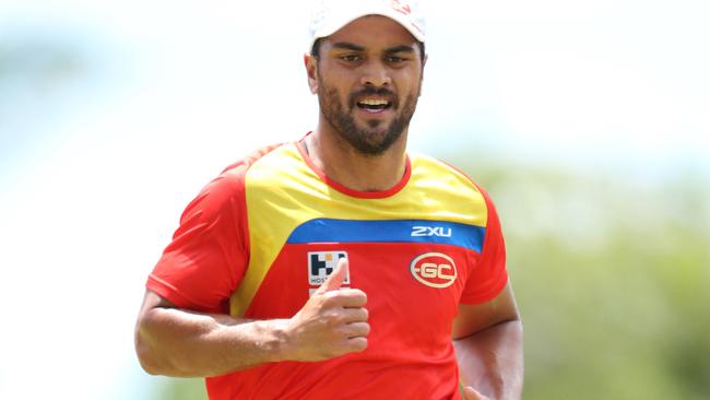 Karmichael Hunt at Gold Coast Suns AFL training session held at Metricon Stadium practice field.