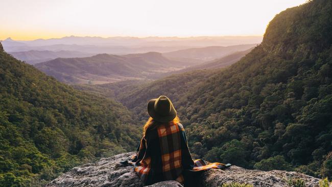 Taking it all in high in the Lamington National Park. Photo: Tourism &amp; Events Queensland