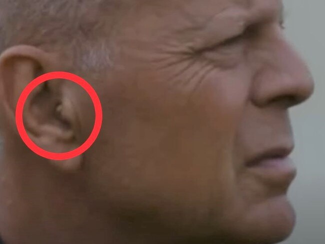 Bruce Willis with an earpiece on the set of American Siege.