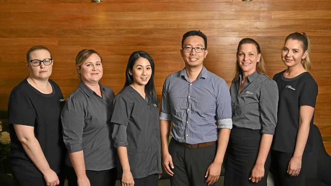 SMILE, YOU&#39;RE IN GOOD HANDS: Sally Payne, Brigid McDermid Kathleen Vu, David Chen, Pamela Fisher and Logan Reed of Ipswich Dental Care. Picture: Cordell Richardson