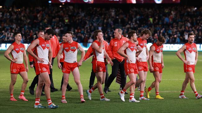 ADELAIDE, AUSTRALIA - AUG 03: The Swans after their loss during the 2024 AFL Round 21 match between the Port Adelaide Power and the Sydney Swans at Adelaide Oval on August 03, 2024 in Adelaide, Australia. (Photo by James Elsby/AFL Photos via Getty Images)