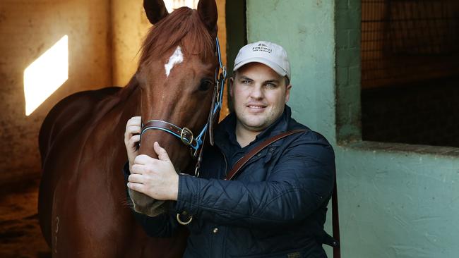 Trainer Bryce Heys with Spieth at his Warwick Farm stables in Sydney. Picture: Brett Costello