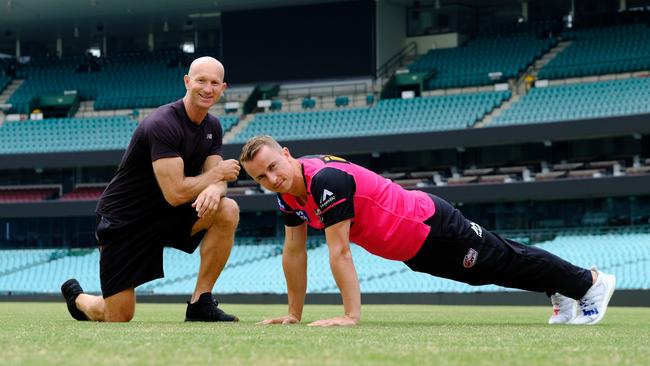 Adam MacDougall puts cricketer Tom Curran through his paces. Picture: Aidan Williams