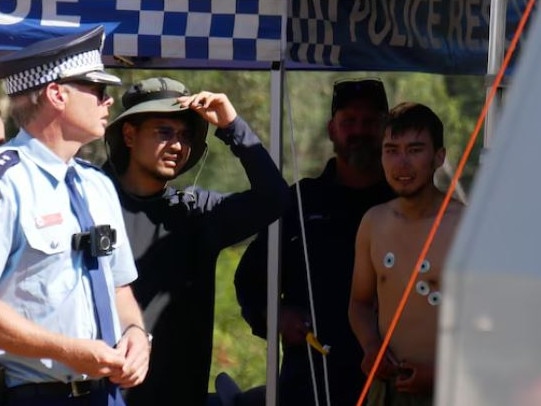 Hadi Nazari can be seen bare-chested after he was found alive in dense NSW bushland in the  kosciuszko national park. Picture: ABC/Adriane Reardon