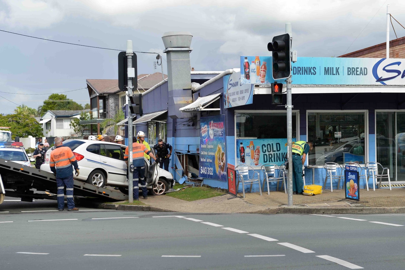 A woman in her 20s sufferd oil burns from a deep fryer after a car crashed into the Swan Bites Fish and Chip Shop at Maroochydore this morning.