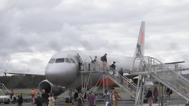 People disembark a domestic Jetstar flight at the Ballina-Byron Gateway Airport on June 20, 2020. Picture: Brook Mitchell/Getty Images