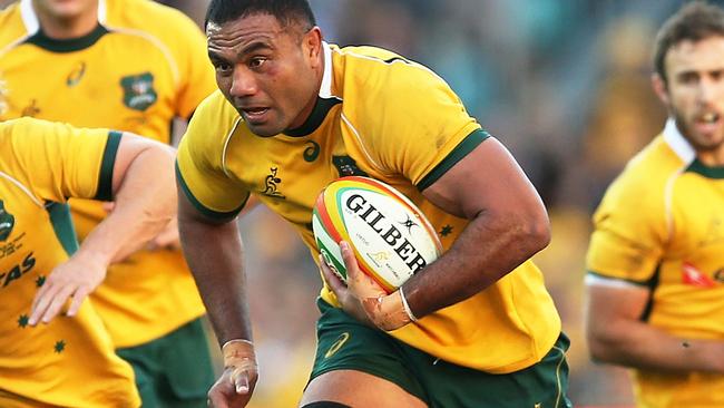 SYDNEY, AUSTRALIA - JUNE 21: Wycliff Palu of the Wallabies runs the ball during the International Test match between the Australia Wallabies and France at Allianz Stadium on June 21, 2014 in Sydney, Australia. (Photo by Brendon Thorne/Getty Images)