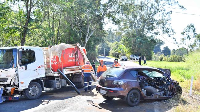 A man was trapped in his car with life threatening injuries after a crash with a truck, Bli Bli Road. Picture: Patrick Woods.