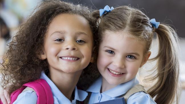 Check in with your child a few times over the weeks leading up to school with a low-key question or two. Picture: iStock