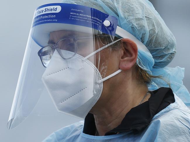 MELBOURNE, AUSTRALIA - NewsWire Photos SEPTEMBER 18, 2020:   Health workers are seen in full PPE at a pop-up COVID19 test site in Clyde, Melbourne, Victoria. Picture: NCA NewsWire / Daniel Pockett