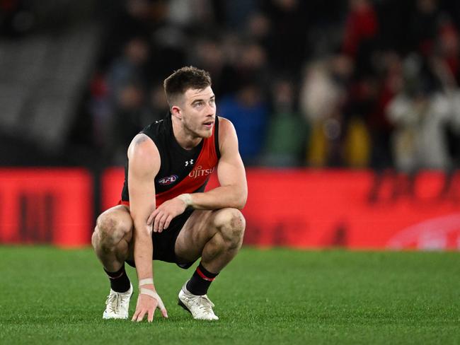 MELBOURNE, AUSTRALIA - JULY 19: Zach Merrett of the Bombers reacts on the final siren during the round 19 AFL match between Essendon Bombers and Adelaide Crows at Marvel Stadium, on July 19, 2024, in Melbourne, Australia. (Photo by Daniel Pockett/Getty Images)