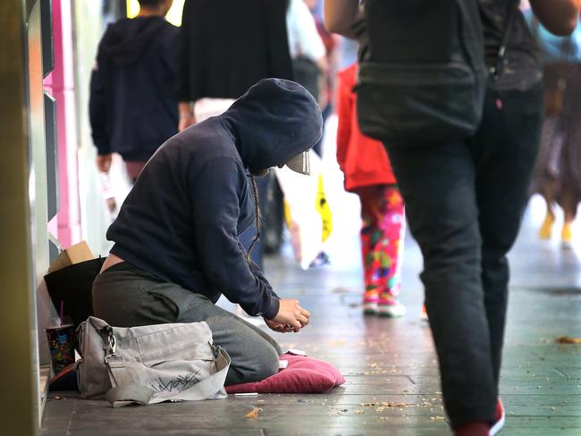 Beggars are commonplace around Melbourne CBD. Picture: David Caird