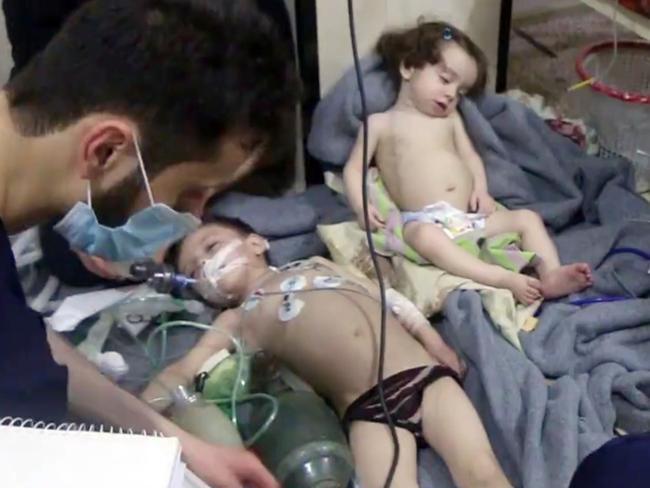 Video from the Syrian Civil Defense White Helmets, shows medical workers treating toddlers following an alleged poison gas attack in the opposition-held town of Douma, in eastern Ghouta, near Damascus, Syria. Picture: Syrian Civil Defense White Helmets via AP, File.