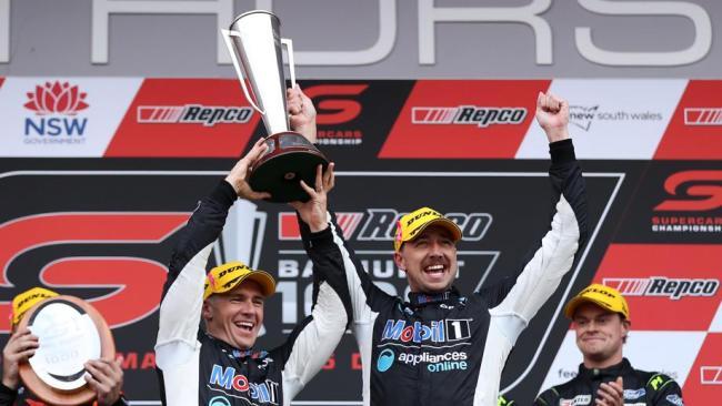 Lee Holdsworth and Chaz Mostert celebrate the victory.