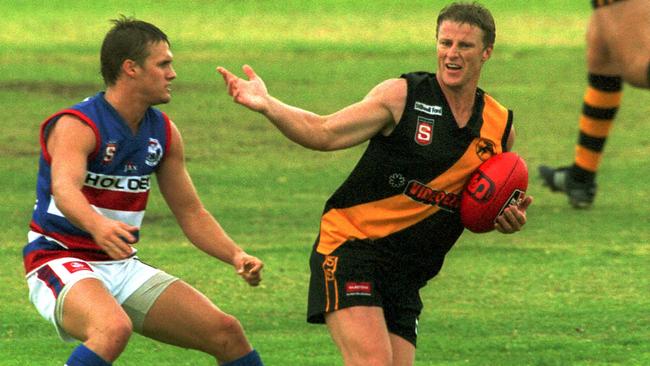 Jacob Surjan and current Richmond coach Damien Hardwick were aligned to Central District and Glenelg respectively when with the Power in 2004.