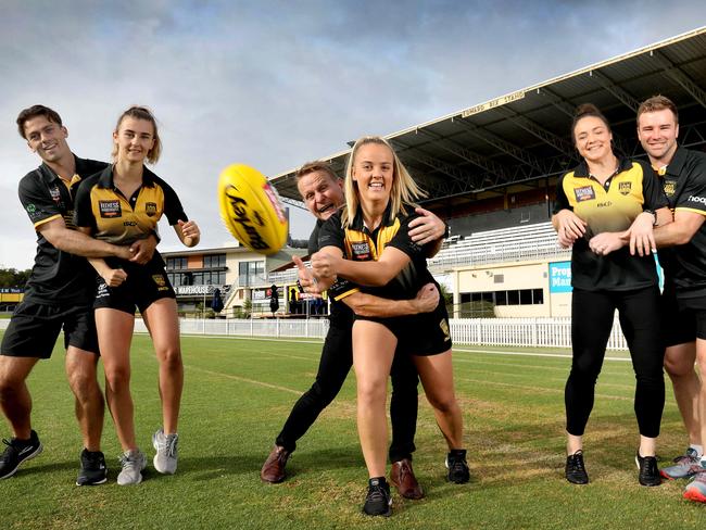 Glenelg has a few sister/brother/partner combinations, playing in its men's and women's league sides this year. (LtoR) Shae and her brother, Luke Partington, Nick Chigwidden with daughter Laura, and Alice and Andrew Bradley, at Glenelg oval. 25 February 2021. Picture Dean Martin