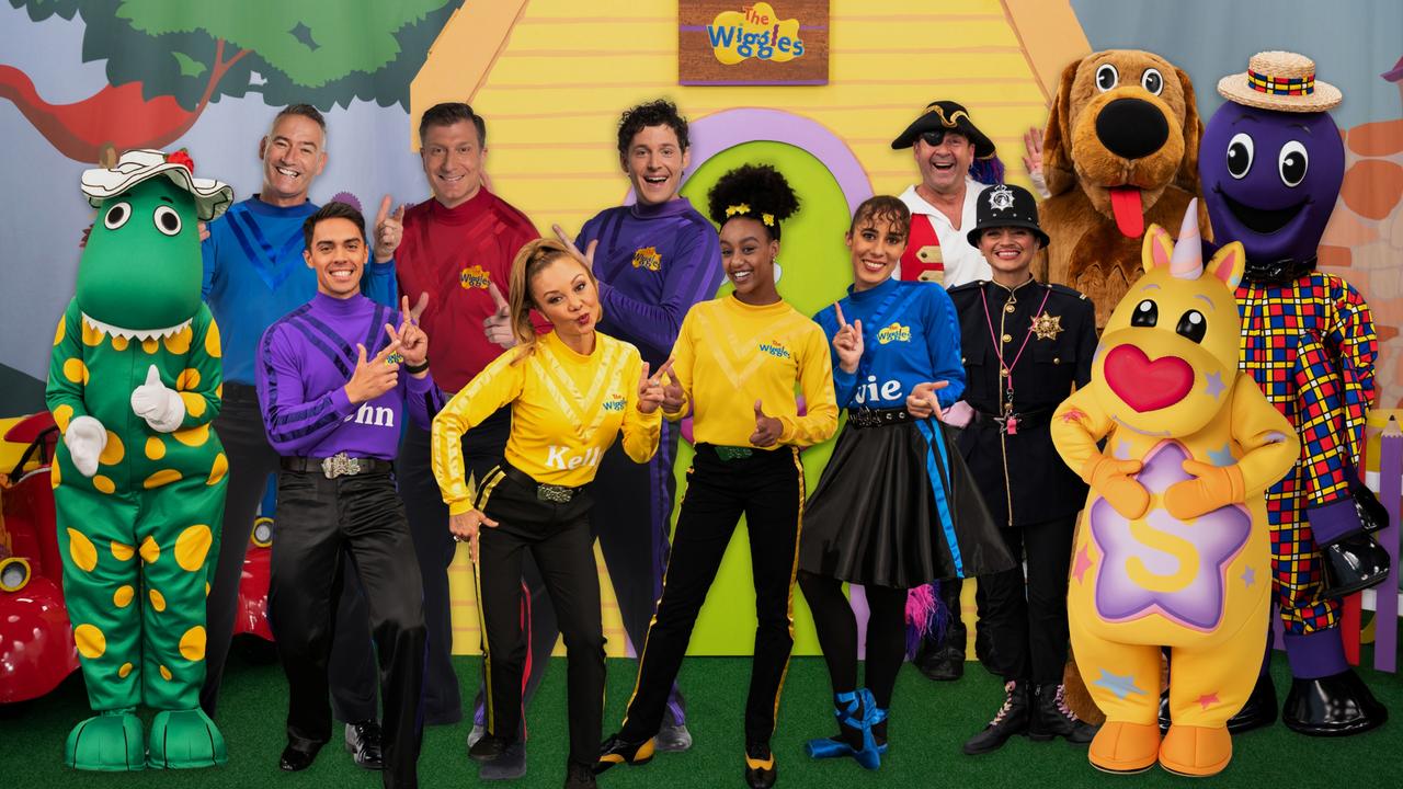 The cast of the Fruit Salad TV Big Show includes new Yellow Wiggle Tsehay Hawkins, pictured centre right in yellow.
