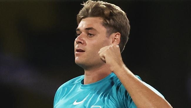 SYDNEY, AUSTRALIA - FEBRUARY 02: Spencer Johnson of the Heat celebrates taking the wicket of Dan Christian of the Sixers during the Men's Big Bash League match between the Sydney Sixers and the Brisbane Heat at Sydney Cricket Ground, on February 02, 2023, in Sydney, Australia. (Photo by Matt King/Getty Images)