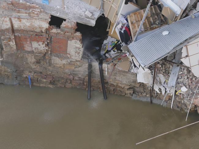 A section of the damaged wall and buildings after the Hobart Rivulet collapse. Picture: MATT THOMPSON