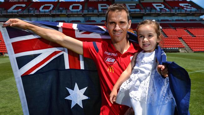 Adelaide United captain Isaias becomes an Australian citizen with his daughter Vega at a ceremony at Hindmarsh Stadium after five years with the Reds, Tuesday, January 8, 2019. (AAP Image/ Brenton Edwards)