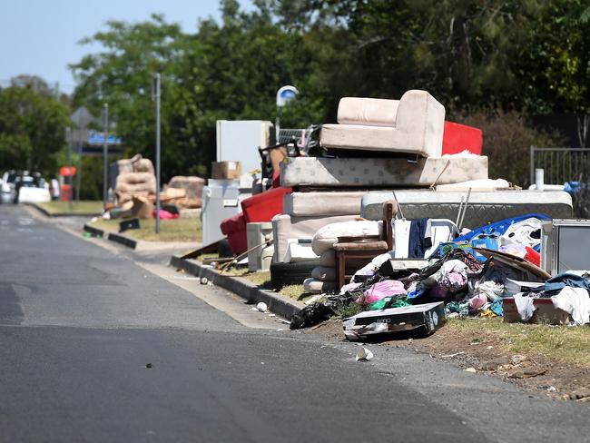 Rubbish left on the footpath with kerbside collection outside a unit complex on Gledson Street in North Booval.