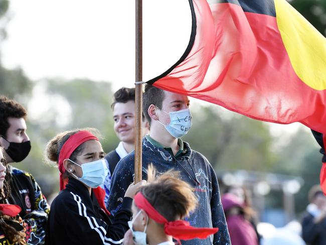 Peaceful Protest in Solidarity with the uprising in the US and against the murder of Aboriginal people in custody, Cotton Tree. Leanna Hunter and Max Mellin.(holding flag). Photo Patrick Woods / Sunshine Coast Daily.