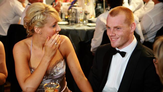 Cooney and partner Hayley react to his victory at the 2008 Brownlow Medal count.