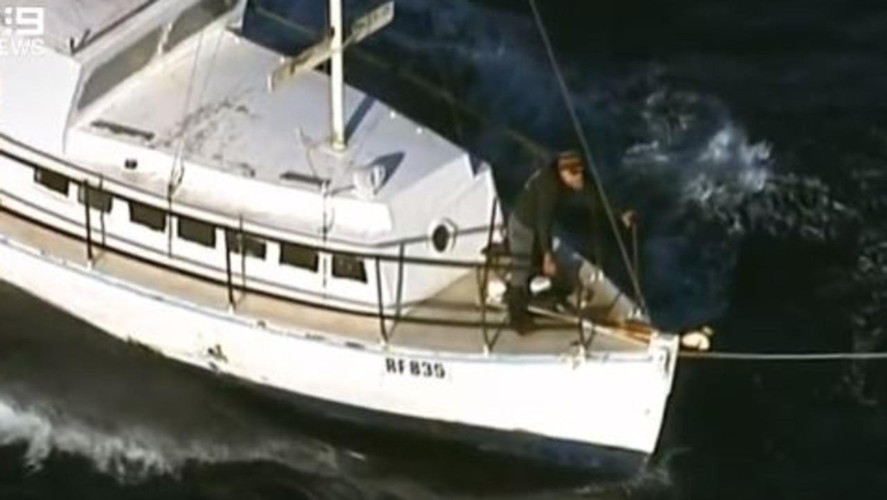 Boaties Tony Higgins and Derek Robinson aboard their boat found off the Coorong coast after almost a week at sea. Their vessel was towed back to Victor Harbor by SA Police. Picture: Nine News Adelaide