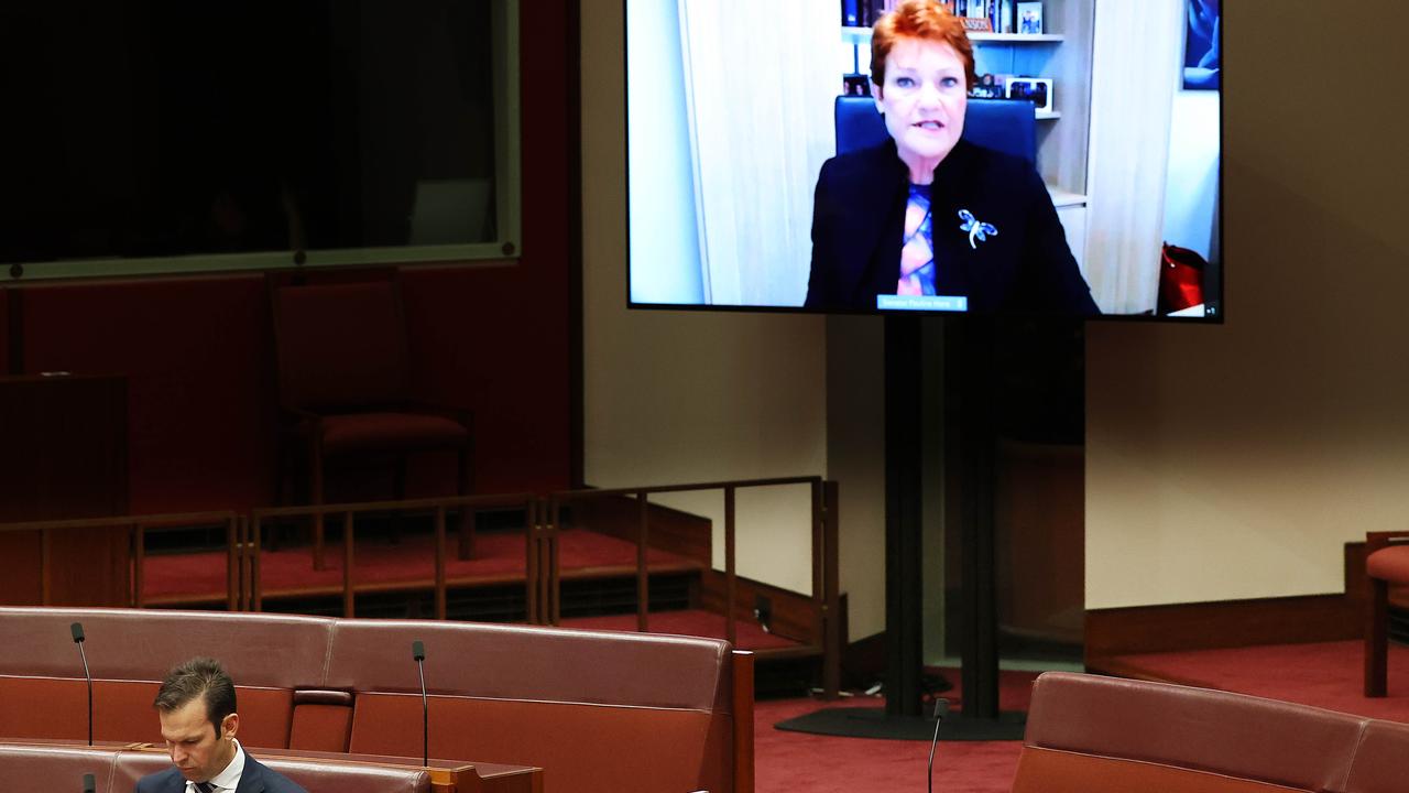 Senator Pauline Hanson via video link and Senator Matt Canavan in the Senate Chamber in Parliament House on Monday. Picture: NCA NewsWire / Gary Ramage