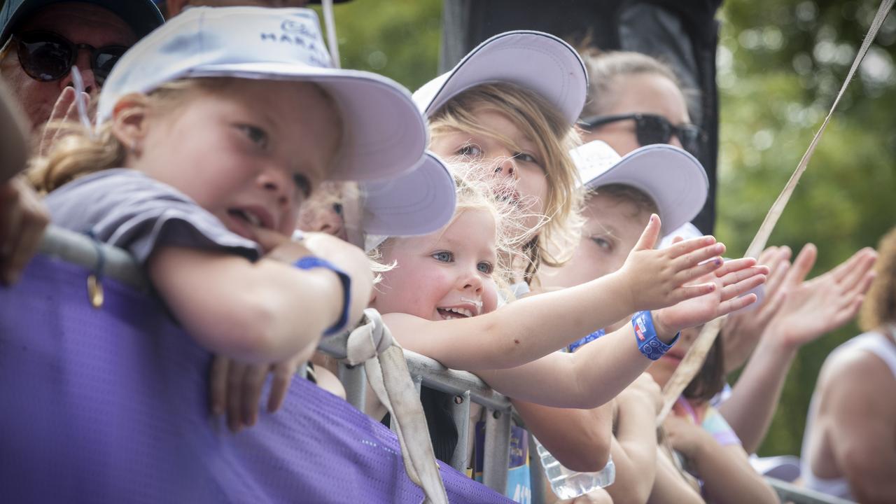 Ruby Wilson cheers on runners during the Cadbury Marathon. Picture: Chris Kidd