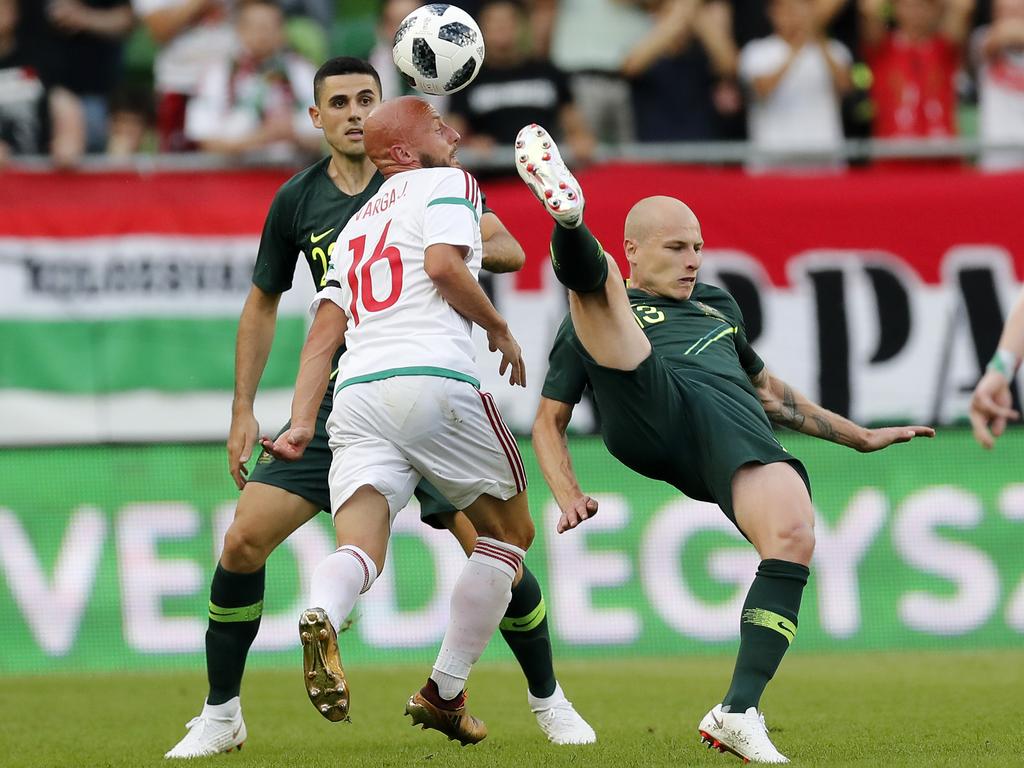 The combined World Cup experience of Aaron Mooy and Tom Rogic may prove vital for Australia’s Qatar campaign. Picture: Laszlo Szirtesi/Getty Images