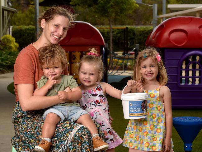 Erin Townley from Mackay with Logan, 2, Allie, 3, and Mia, 4, at the Ronald McDonald House at the University Townsville Hospital. Picture: Evan Morgan