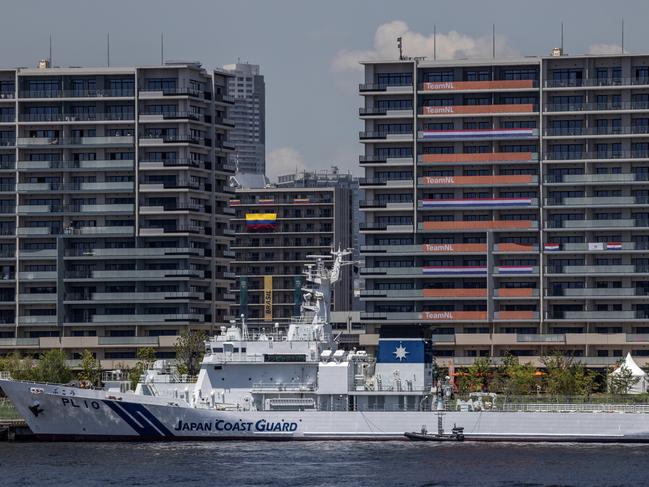 TOKYO, JAPAN - JULY 19: A Japan Coast Guard  vessel is moored at the Tokyo Olympics athletes village on July 19, 2021 in Tokyo, Japan. Two South African football players have become the first athletes inside the Olympic Village to test positive for COVID-19. Other cases connected to the Games were also recently confirmed including eight Team GB members who have had to enter isolation after contact with a coronavirus case on their flight to Tokyo. (Photo by Carl Court/Getty Images)