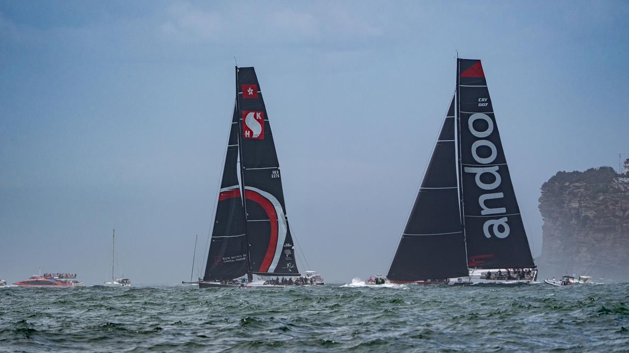 Super Maxis Andoo Comanche (R) and SHK Scallywag (L) sail towards Sydney Heads. Photo by Andy Cheung/Getty Images.