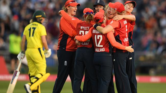 The Poms celebrate the wicket of Meg Lanning.