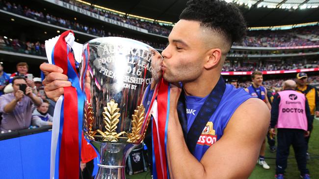 Jason Johannisen celebrates with the premiership cup. Picture: Getty Images