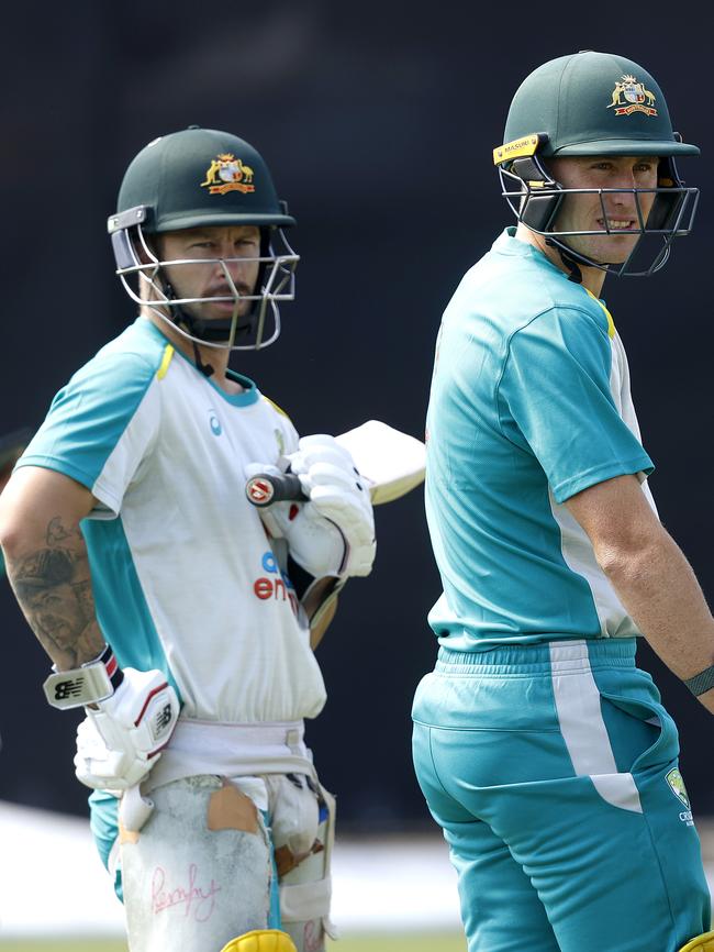 Matthew Wade and Marnus Labuschagne wait to bat. Picture. Phil Hillyard