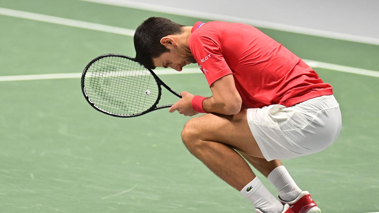Novak Djokovic may not go to the Australian Open. (Photo by JOE KLAMAR / AFP)