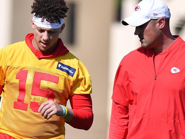 DAVIE, FLORIDA - JANUARY 29: Patrick Mahomes #15 speaks with quarterback coach Mike Kafka during the Kansas City Chiefs practice prior to Super Bowl LIV at Baptist Health Training Facility at Nova Southern University on January 29, 2020 in Davie, Florida. (Photo by Mark Brown/Getty Images)