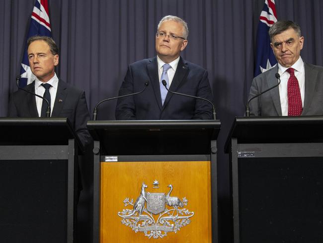 Prime Minister Scott Morrison with the Minister for Health Greg Hunt and Australian Government Chief Medical Officer Brendan Murphy. Picture: Gary Ramage