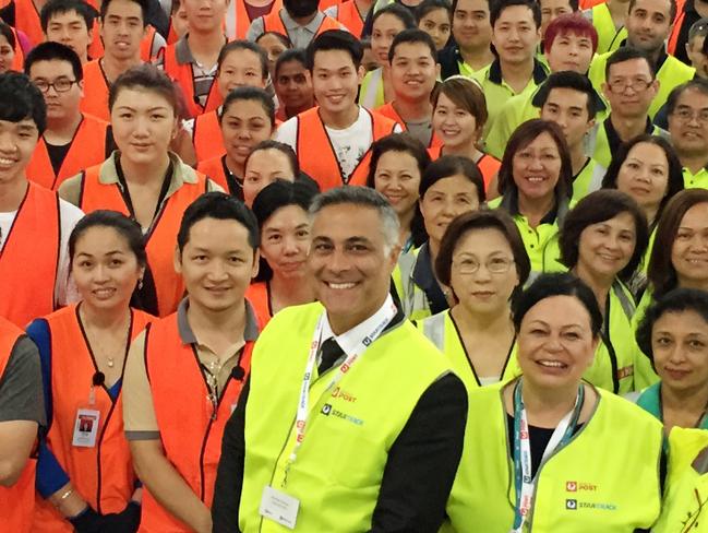 With staff at Australia Post's parcel facility. Picture: Kris Reichl