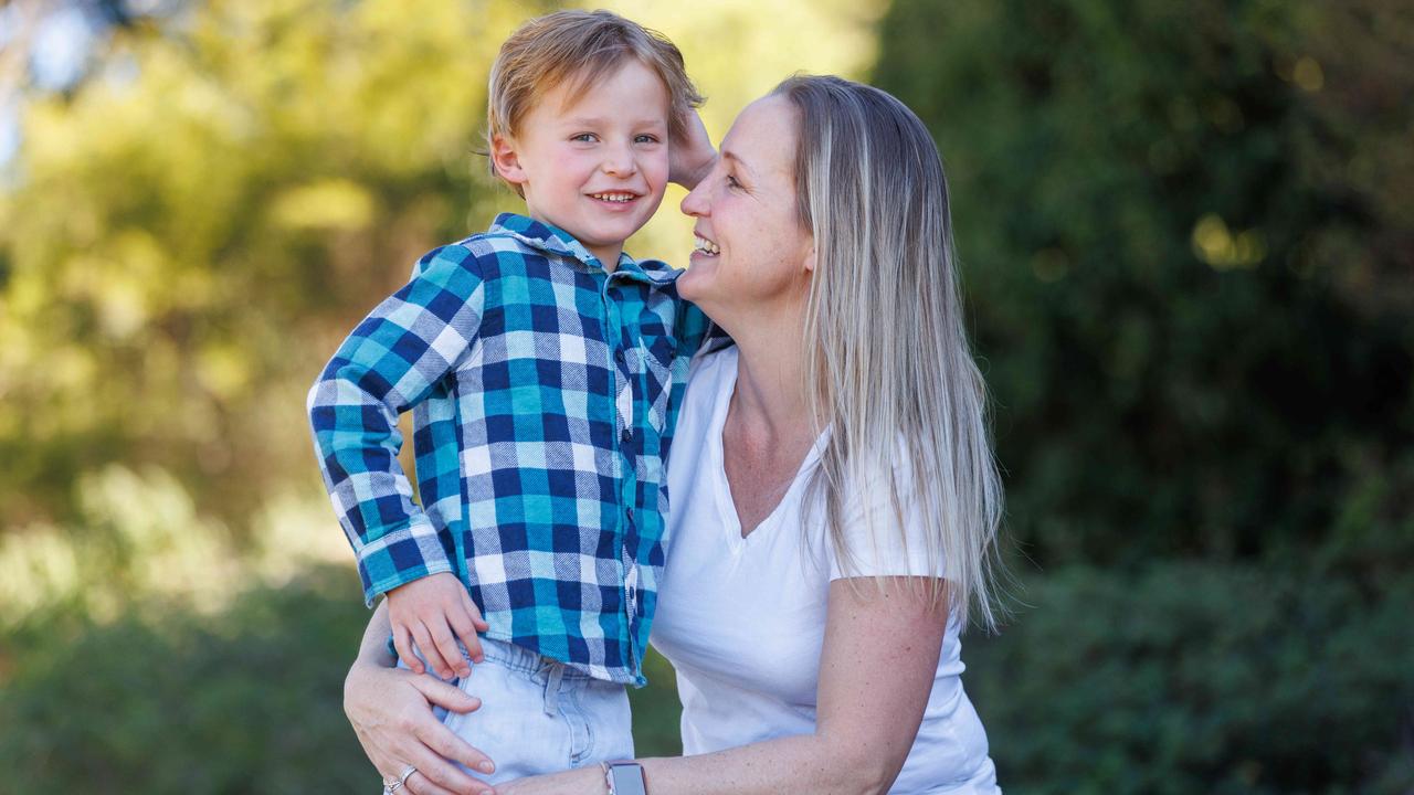 Olivia Kimble and her son, Oscar, 6, who was diagnosed with meningococcal disease. Oscar luckily survived but continues to feel pain from nerve damage in his legs. Picture: David Swift.